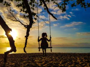 Marli from The Blonde Nomads enjoying a swing in TNQ