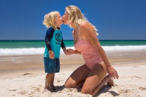 Tracy and Ziggy from The Blonde Nomads wearing Piping Hot swimwear made from 100% recycled bottles