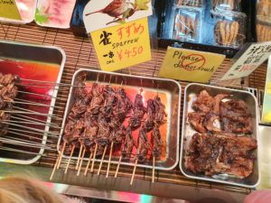 Sparrow on a stick in Kyoto Japan with The Blonde Nomads