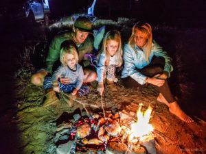 Cooking mud crabs over hot coals 