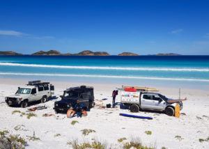 Setting up for the day on Lucjy Bay Beach for surfing and beach fun