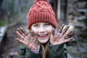 Wild and free playing in the mud